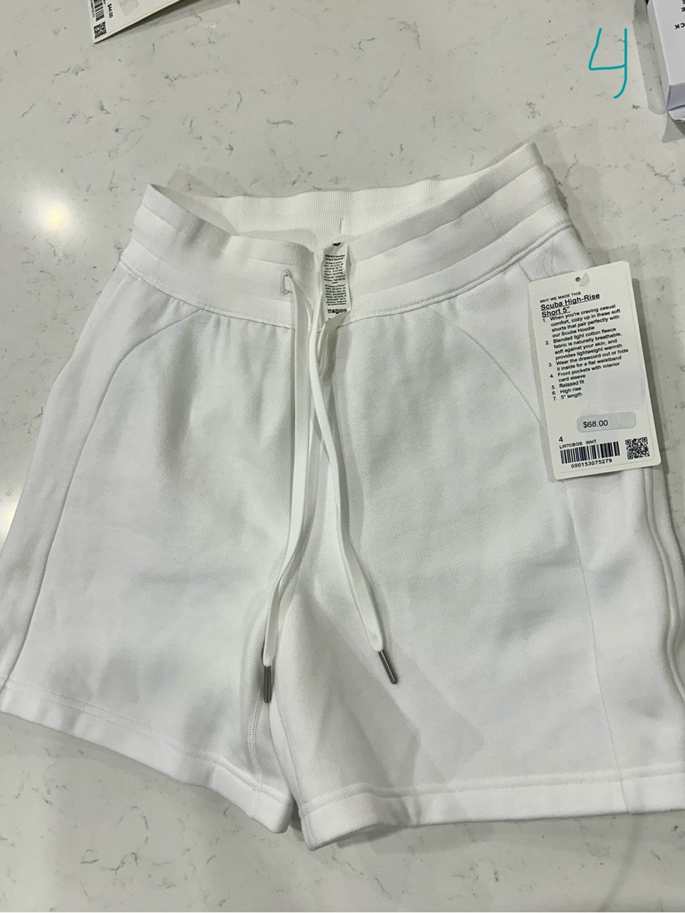 White Lululemon Scuba high rise shorts